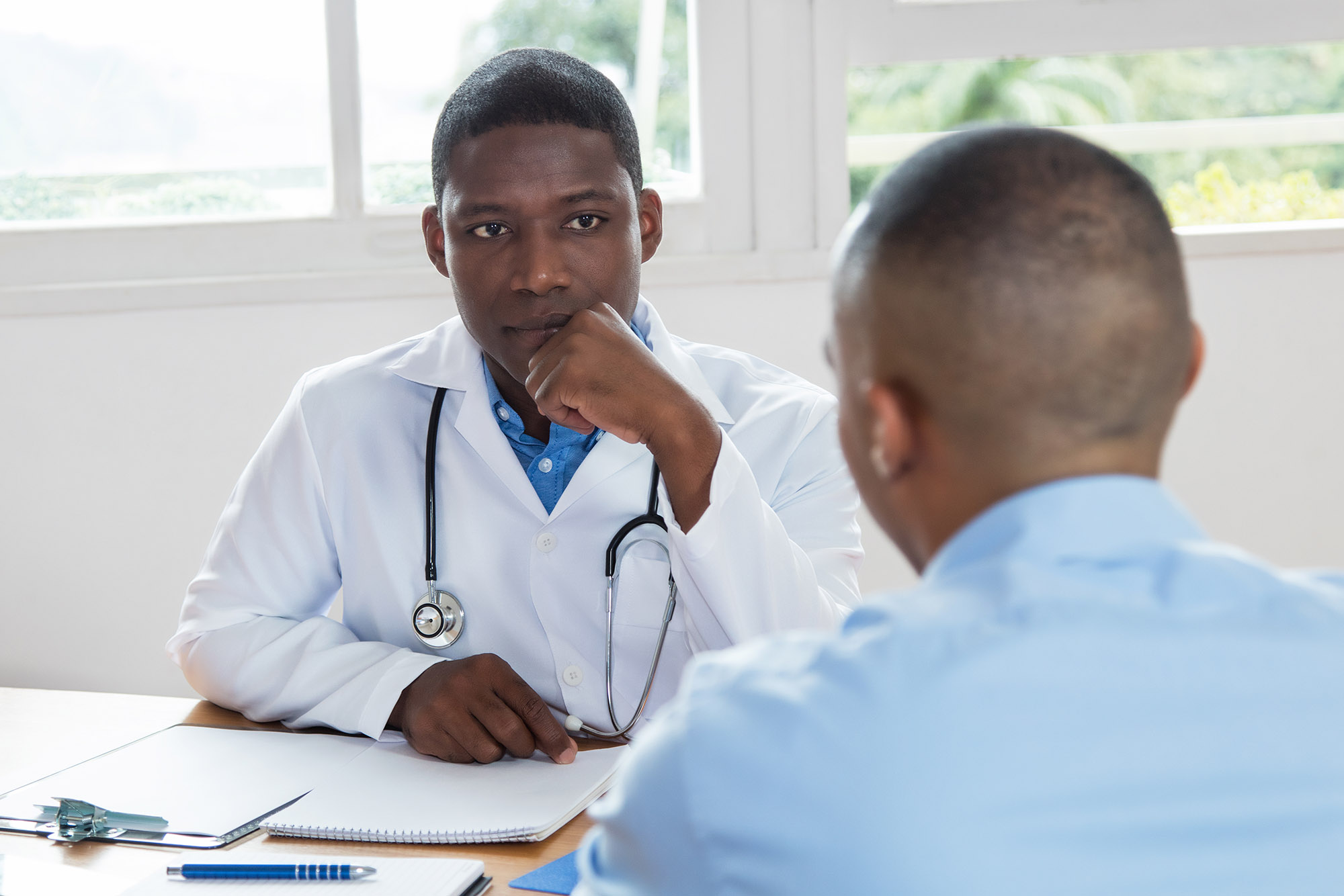 health care provider talking to patient