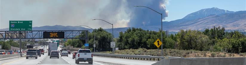 smoke seen from a distance from highway