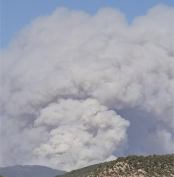 Billowing white smoke