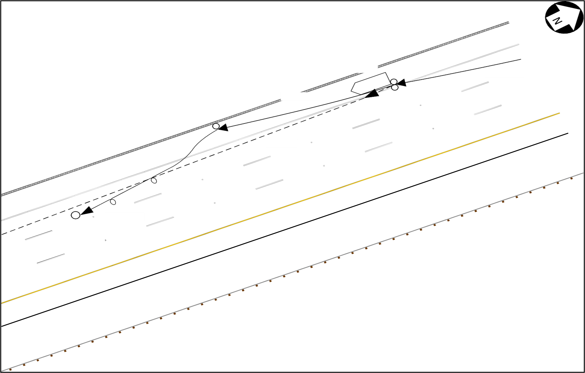 The Toyota’s path (arrow) after it struck the tow truck and victim.