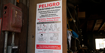 full length spanish sign hanging in the work area