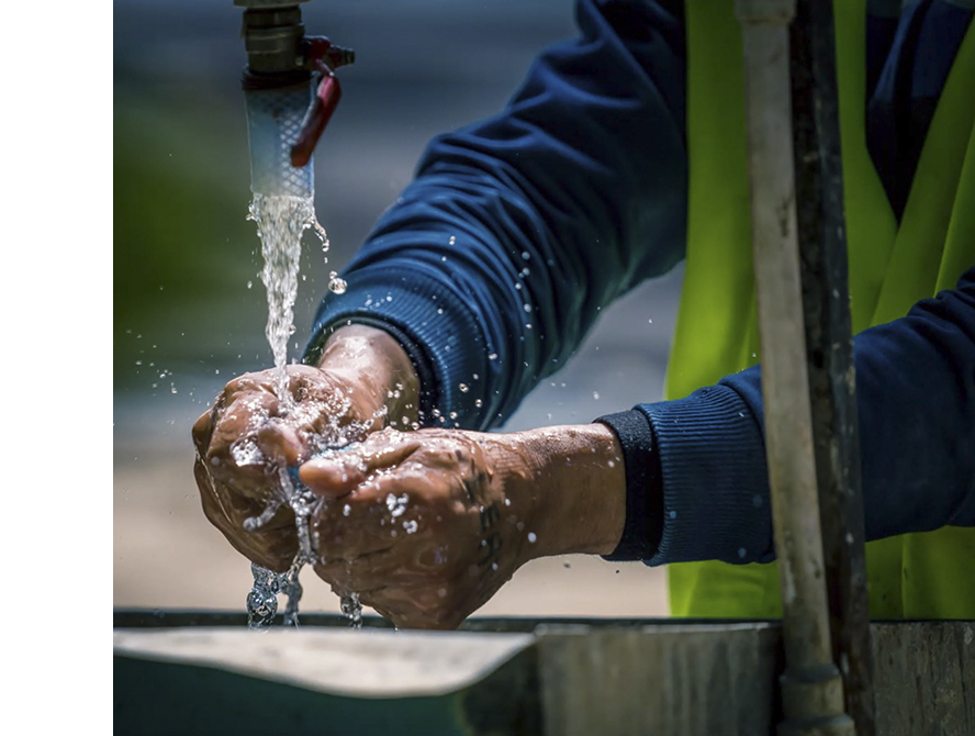Worker washing hands