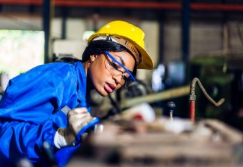 worker looking at construction boards