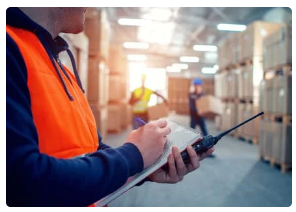 Warehouse worker supervisor using checklist
