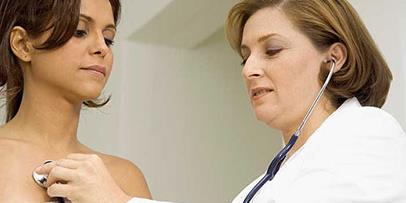 Health care professional with patient