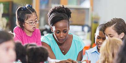 Teacher with school children