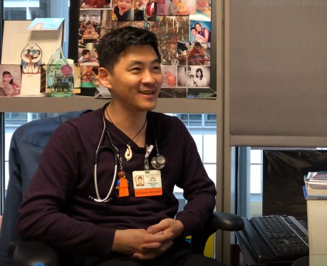 James at work (pediatrician) smiling