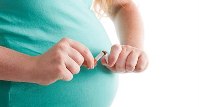 pregnant individual breaking smoking habit