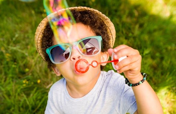 Child blowing bubbles