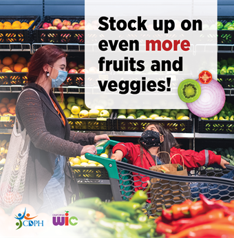 Stock up on even more fruits and veggies! Adult and child in produce section at grocery store.