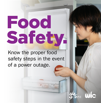 Food Safety. Person looking inside fridge and holding open the fridge door.
