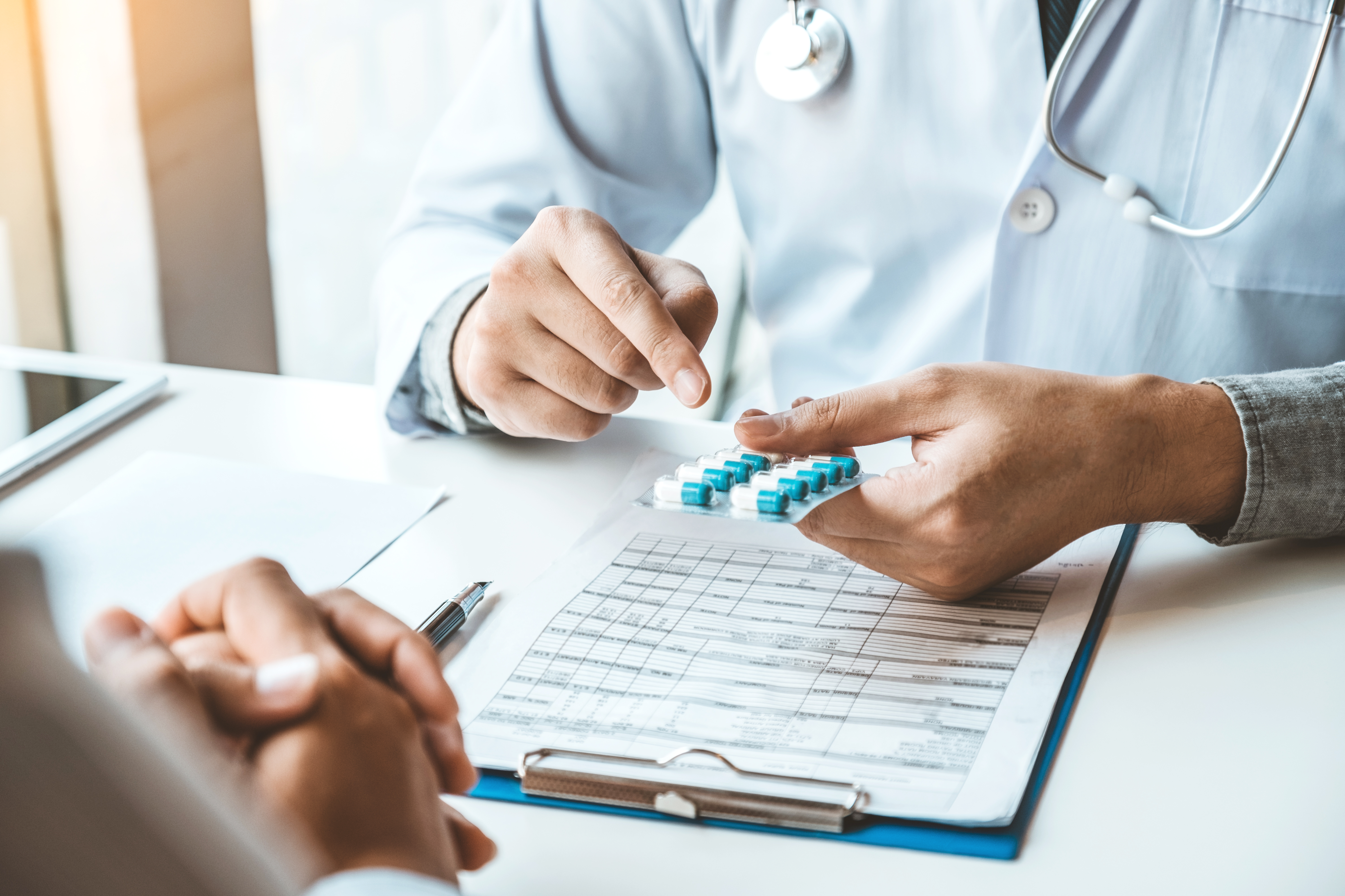 Dr explaining prescription to patient