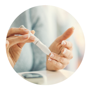 Person pricking their finger prick to test blood sugar level