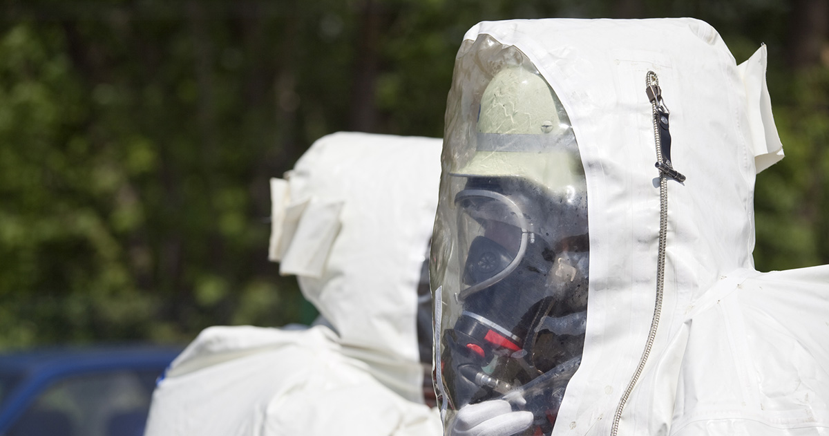 Workers in Hazmat Suits