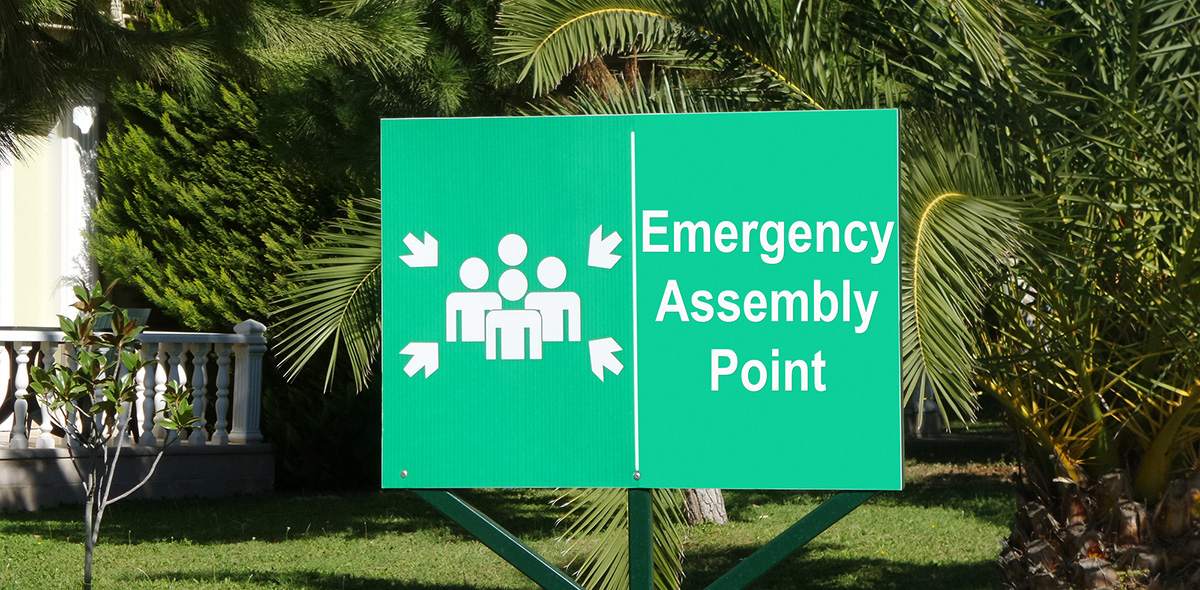 Sign showing an emergency assembly point