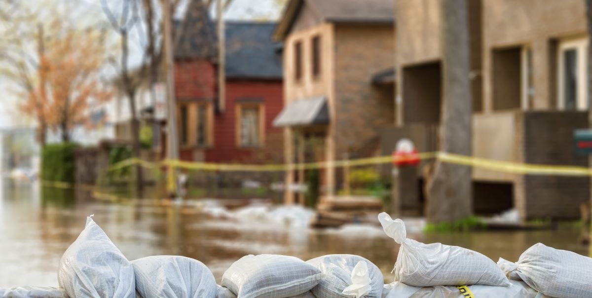 Protection Sandbags with flooded homes