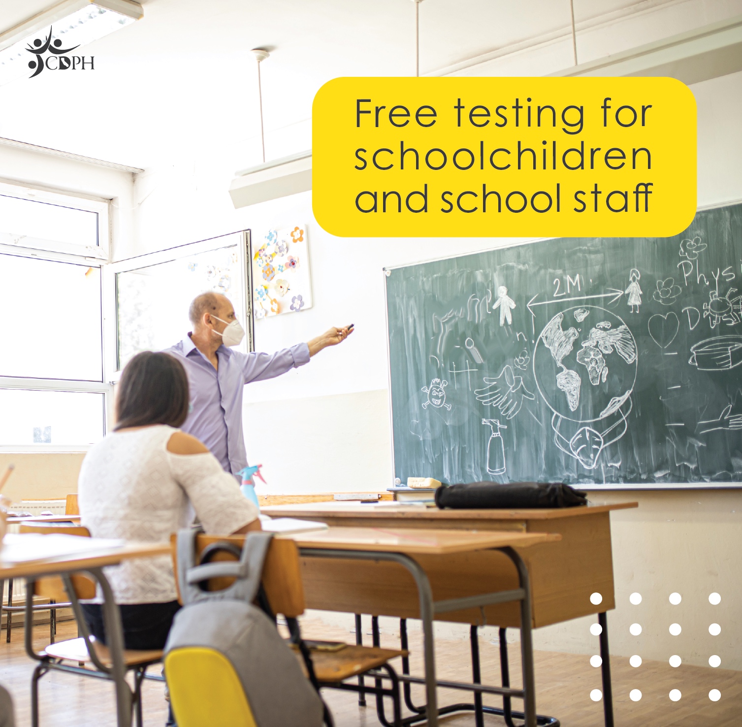 Classroom with teacher and student with text overlay "Free testing for schoolchildren and school staff"