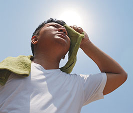 Heat Illness_v2_EDIT.jpg Worker out in the hot sun