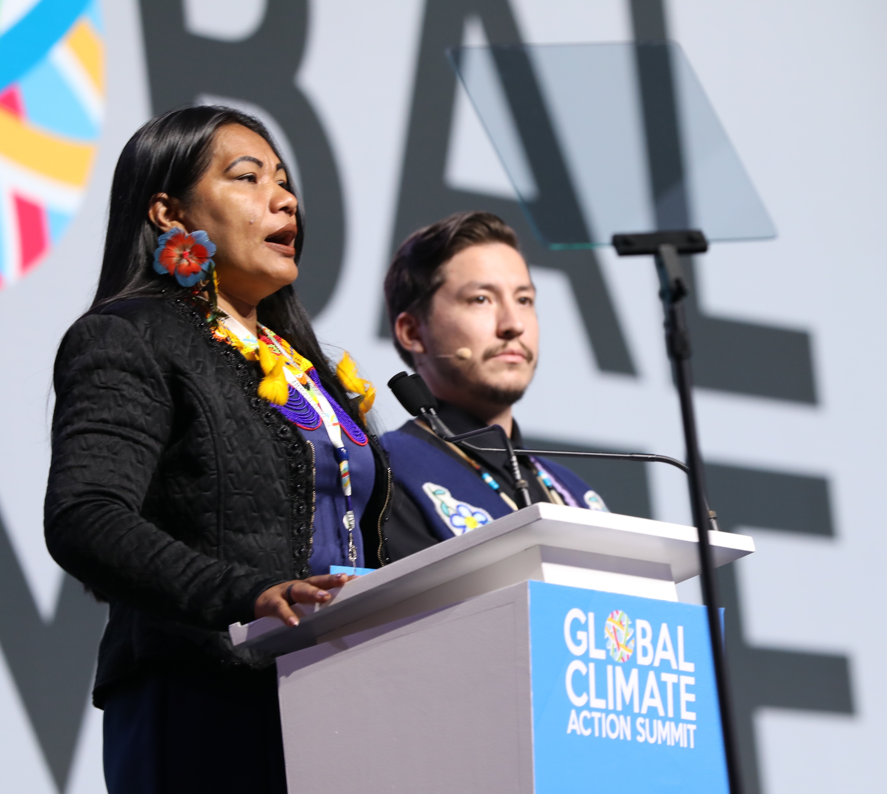 Indigenous and Tribal Leaders Francisca Oliveira de Lima Costa and Dana Tizya-Tramm speaking at Summit